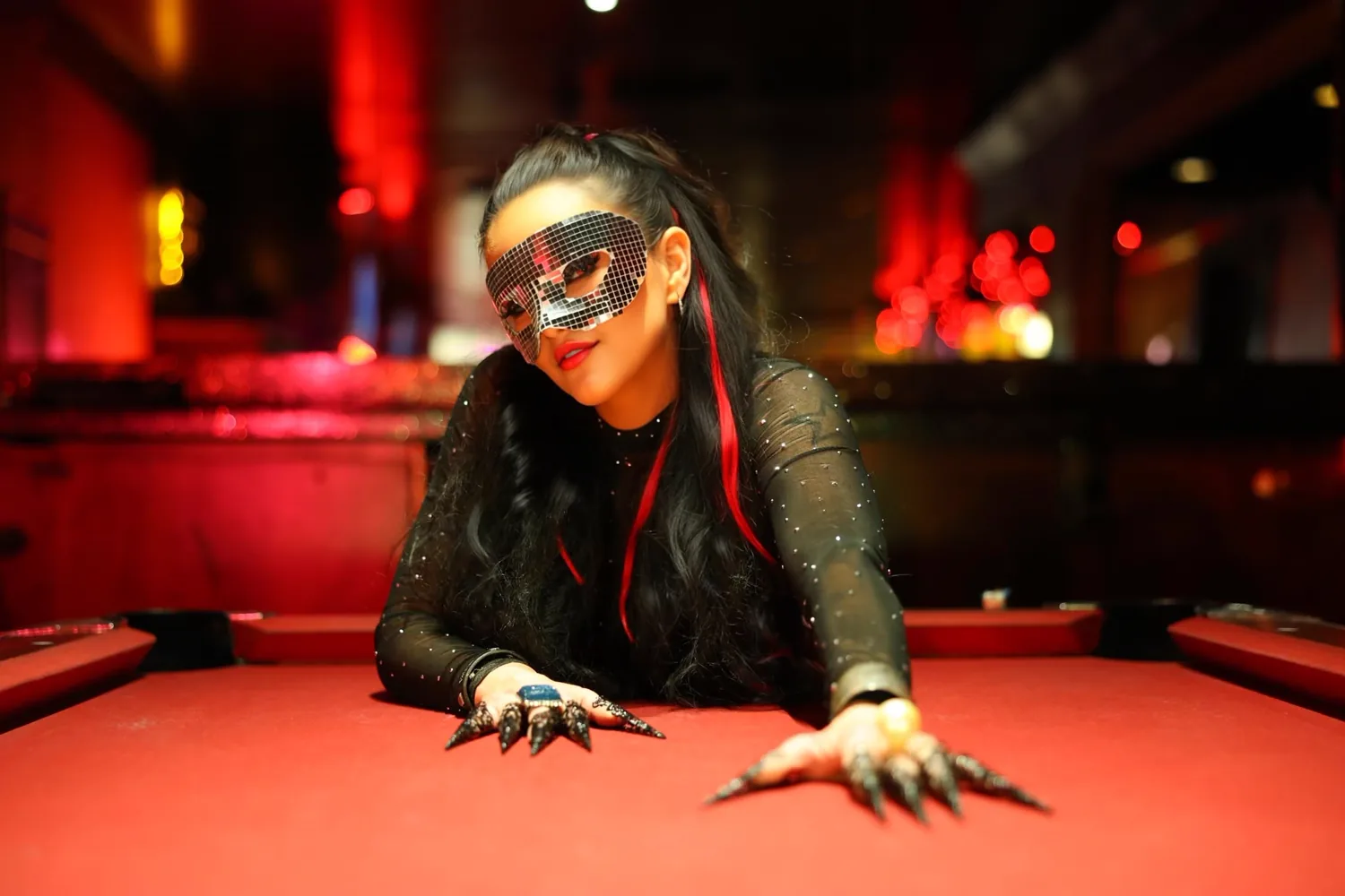 DJ Mea in a mirror mask